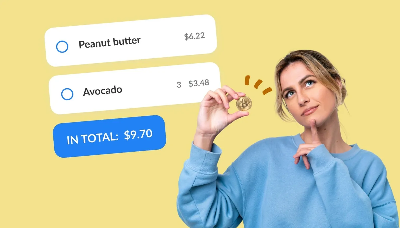 A shopper checking the total of her grocery list