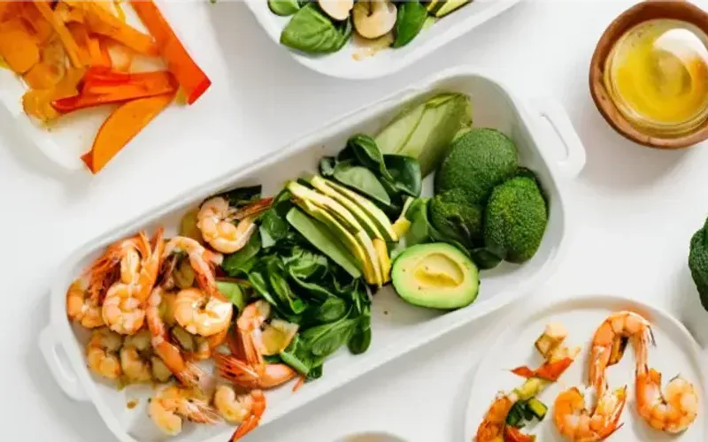 Overhead shot of small bowls of dishes for the 30-day dinner meal plan